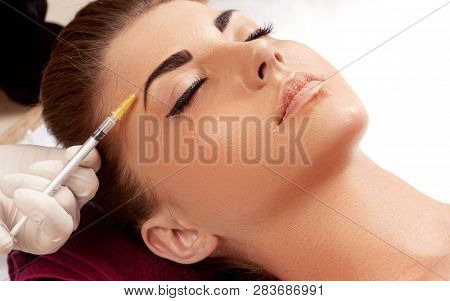 Face Lifting. Beautiful Of Woman  With Face With Perfect Smooth Skin Receiving Hyaluronic Collagen I
