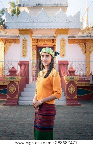 Portrait Of Asian Ethics Woman In Traditional Clothing In Front Of The Temple., Attractive Young Wom