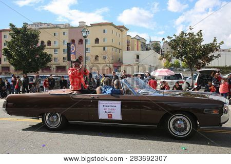 LOS ANGELES - FEBRUARY 9, 2019: Golden Dragon Parade in the streets of China Town Los Angeles. Councilman Gil Cedillo waves to the crowd at the Chinese New Year celebration 2019.


