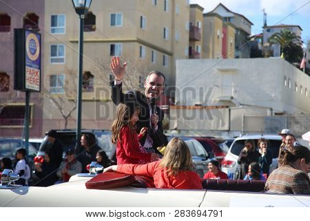 LOS ANGELES - FEBRUARY 9, 2019: Golden Dragon Parade in the streets of China Town Los Angeles. Los Angeles Mayor Eric Garcetti waves to the crown during the Chinese New Year celebration 2019.

