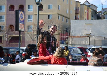 LOS ANGELES - FEBRUARY 9, 2019: Golden Dragon Parade in the streets of China Town Los Angeles. Los Angeles Mayor Eric Garcetti waves to the crown during the Chinese New Year celebration 2019.

