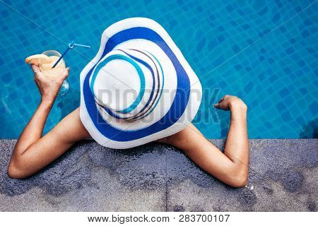 A Beauty Asian Woman Enjoying With Her Summer Vacation At Swimming Pool In Pattaya, Thailand.