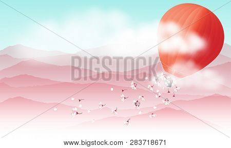 Hot Air Balloon And Clouds Flying Over The Sweet Pink Mountains Landscape And Spread Pink Cherry Flo