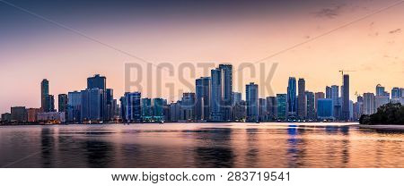 Beautiful Sunset Over Emirate Of Sharjah Skyline In The Uinted Arab Emirates