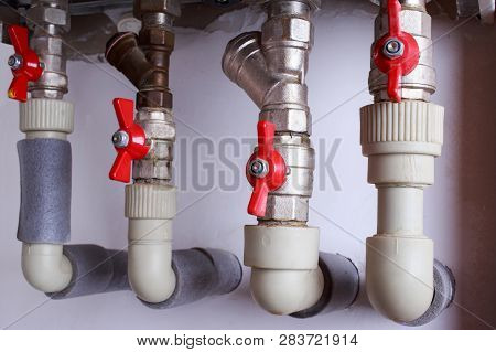 Water Heater System With Taps A Close-up