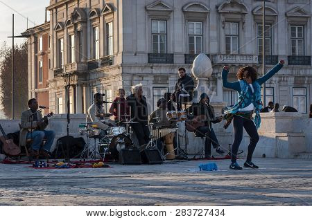 Lisbon, Portugal - January 20, 2012: Street Musicians Playing At The Cais Das Colunas In The City Of