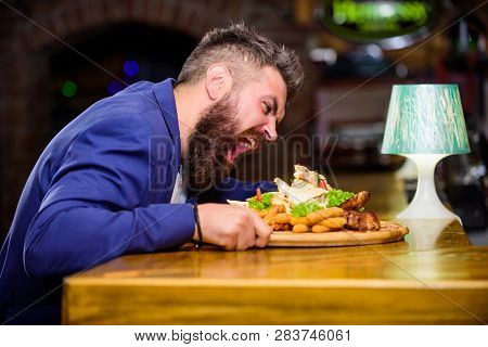 Enjoy Meal. Cheat Meal Concept. Hipster Hungry Eat Pub Fried Food. Manager Formal Suit Sit At Bar Co