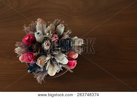 Flowers Made From Paper On The Wooden Table. Pink, White, Yellow, Blue Paper Flowers. Faux Flowers, 