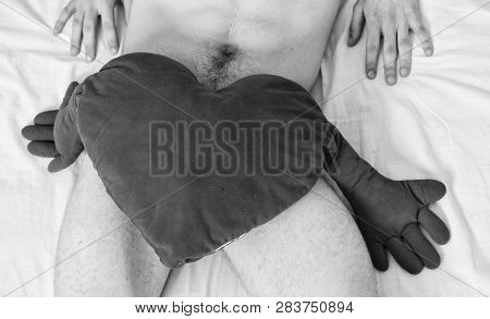 Need To Be Loved. Male Genitals Covered With Big Red Plush Heart Toy. Love And Sex Concept. Valentin