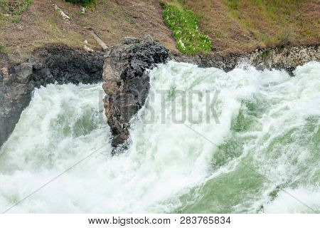 The Spokane River In Spring Flood Near Downtown Spokane, Washington, Usa
