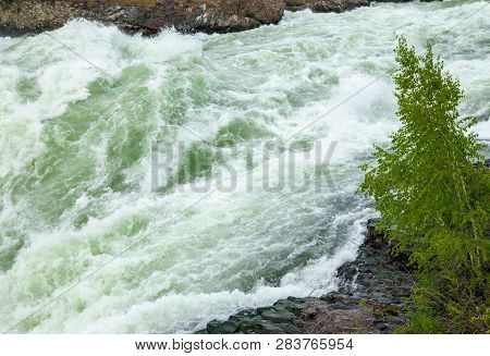The Spokane River In Spring Flood Near Downtown Spokane, Washington, Usa