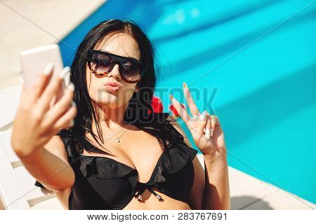 Summer Fashion. Sexy Woman Making Selfie. Fashion Brunette Girl In Trendy Bikini And Sunglasses. Mod