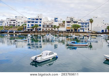 Arrecife, Spain -  November 5, 2018: Waterfront Of The Town And The Old Harbor With Boats