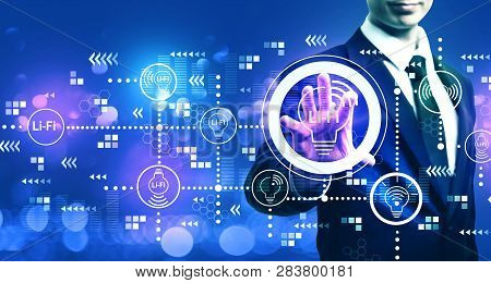 Lifi Theme With Businessman On Blurred Blue Light Background