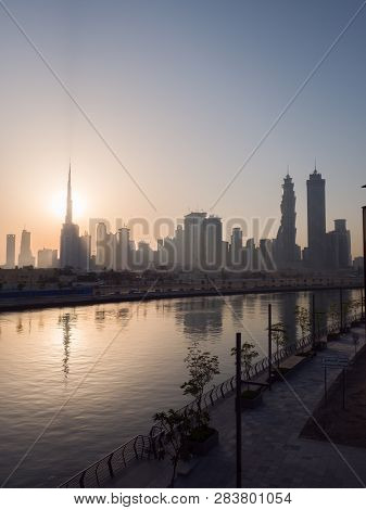 Panorama Of The City Of Dubai Early In The Morning At Sunrise With A Bridge Over The City Channel Du