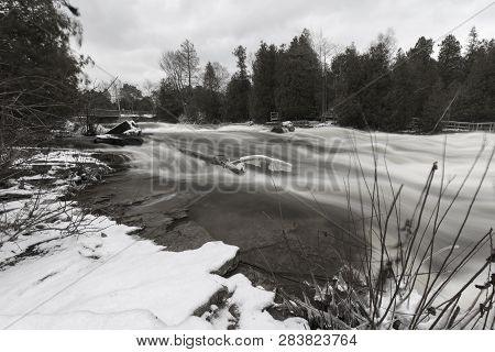 Black And White Photo Of Waterfalls At Sauble Falls Provincial Park Ontario Canada In Winter Conditi
