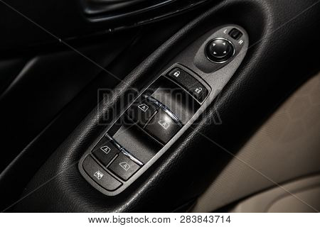Novosibirsk, Russia - February 10, 2019:  Infiniti Q50, Close-up Of The Side Door Buttons: Window Ad