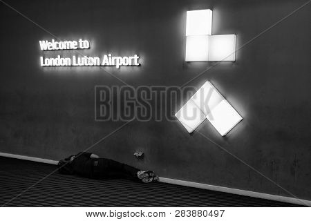 London, England - Jun 1: Man Sleeping In Front Of Departure Hall  After Canceled Flight At Airport L