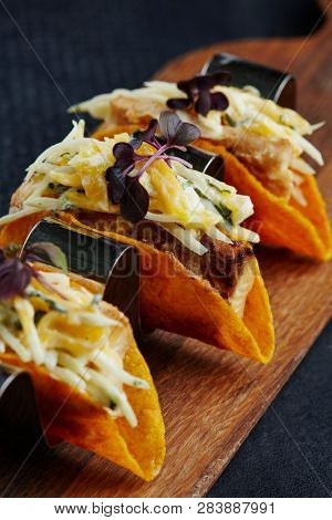mini corn tacos with cod filling