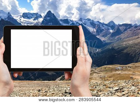 Travel Concept - Tourist Photographs Of Of Dombay Resort From Upper Ski Station In Teberda Nature Re