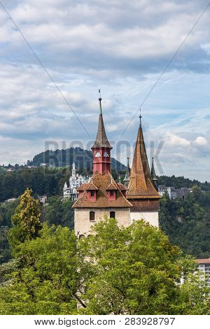 View Of Luegisland Tower (luegislandturm) And Watch Tower (wachturm). Musegg Wall, Lucerne, Switzerl