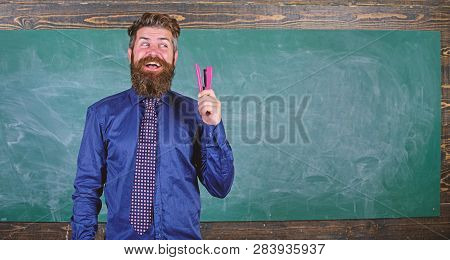 School Stationery. Prepare For School Season Buy Stationery. Man Smiling Hold Stapler Stationery. Hi