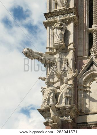 Statues On The Facade Of A Cathedral, Italy