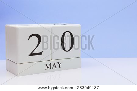 May 20st. Day 20 Of Month, Daily Calendar On White Table With Reflection, With Light Blue Background