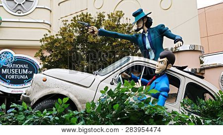 Osaka, Japan - Feb 11 2019 : Lupin The 3rd Car Chase Xr Ride At The Entrance Of Lupin And  Jigen Fig