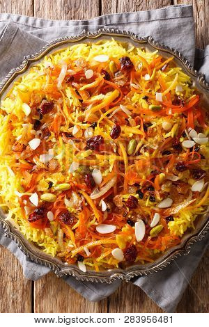 Persian Delicious Pilaf Javaher Polow (jeweled Rice) Closeup On A Plate On The Table. Vertical Top V