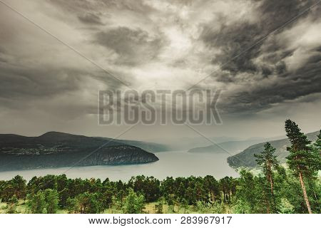 Norwegian Landscape. Green Mountains Hills And Fjord, Stormy Rainy Weather.