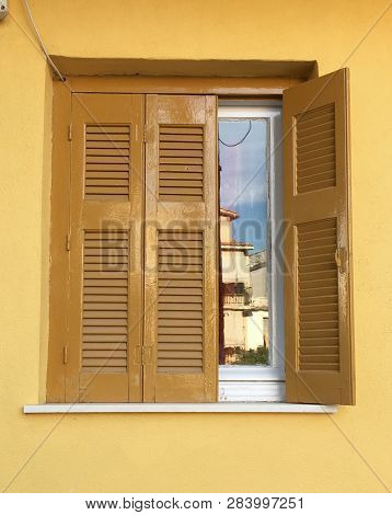Yellow Brown  Wooden Window On Yellow Castle Old Stone Pattern Texture Wall Close