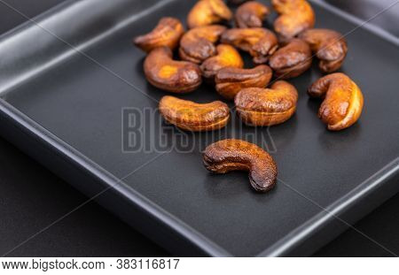 The Cashew Nuts Are Roasted Until Burnt Overcooked To A Black, Dark Brown Flavor, Too Bitter And Har