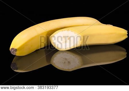 Fruits Of Yellow Bannan On Black Background, Reflection