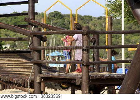 Salvador, Bahia / Brazil - September 7, 2013: Children Are Seen Playing In A Playground Near Lagoa D