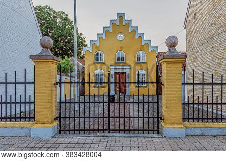 Yellow Mansonic Lodge With Symbols Behind An Iron Gate, Faaborg, Denmark, August 16, 2020