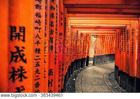 Kyoto, Japan - 2013 March 28: Walkway At Red Torii Gates In Fushimi Inari Shrine, One Of Famous Land