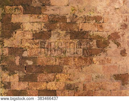 Random Pattern Rastic Of Brown And Orange Color Natural Clay Old Brick In The Wall Background