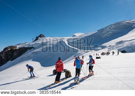 Cervinia, Italy - July 18, 2020: Skiers Enjoying Summer Skiing On Plateu Rosa