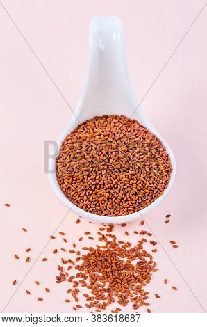 Seeds Of Lepidium Sativum In White Spoon.