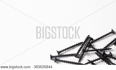 Self-cutters On A White Background Banner With Space For Text. Construction Tools, Self-tapping Scre