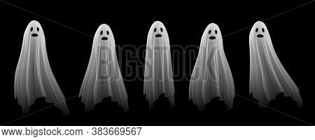 Ghost On A Black Background. An Evil Spirit With A Covered Sheet. Set Of Flying Transparent Spectres