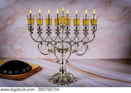 Closeup Of A Burning Chanukah Candlestick With Candles Menorah A Traditional Jewish Holiday