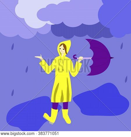 Woman In A Yellow Raincoat Walks Through The Puddles