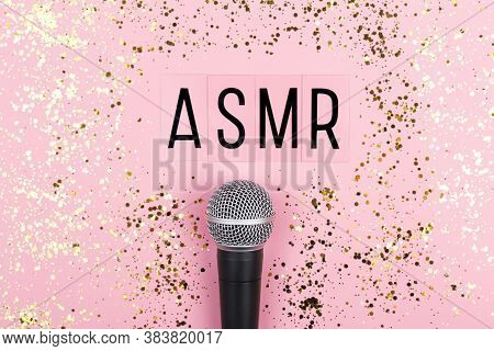 A Microphone And Letters Asmr On Pink Background. Minimal Compostion.