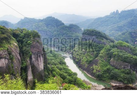 Nine Bend River Seen From The Top Of Tianyou Peak In Wuyishan, Fujian Province China On A Hazy Summe