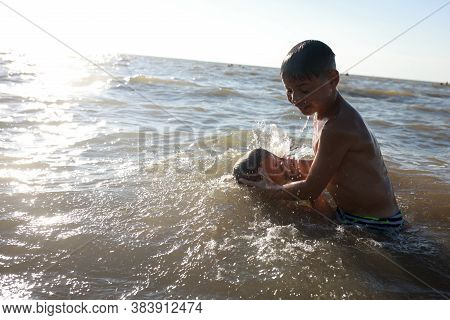 Brothers Swimming In Sea Of Azov, Primorsko-akhtarsk, Russia