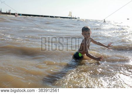 Child Swimming In Sea Of Azov, Primorsko-akhtarsk, Russia