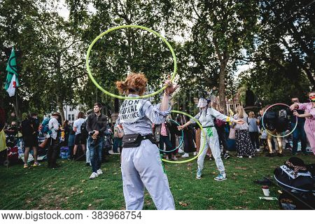 London / Uk - 2020.09.05: People Dancing With Hoola Hoops At Extinction Rebellion Protest At Parliam