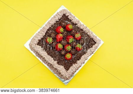 Homemade Chocolate Cake Covered With Chocolate Sprinkles And Fresh Strawberries. Known In Brazil As 